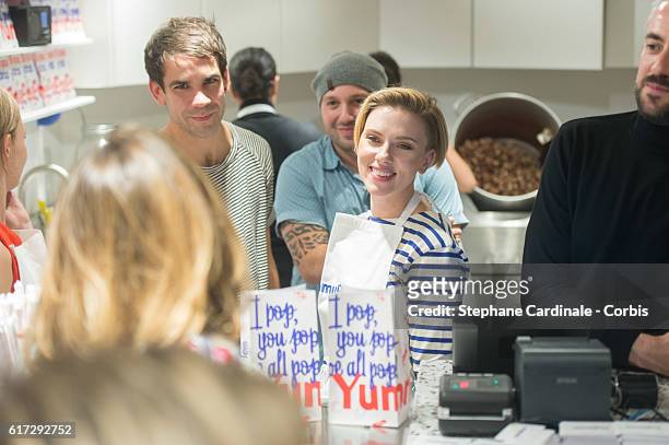 Actress Scarlett Johansson and her husband Romain Dauriac attend the Opening of their New Store "Yummy Pop", on October 22, 2016 in Paris, France.
