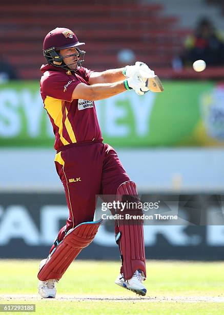 Joe Burns of the Bulls hits for six during the Matador BBQs One Day Cup Final match between Queensland and New South Wales at North Sydney Oval on...