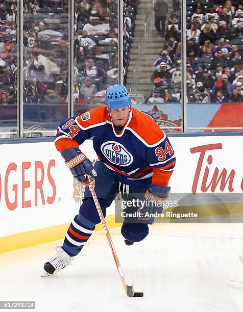 Ryan Smyth of the Edmonton Oilers alumni stickhandles the puck against Winnipeg Jets alumni during the 2016 Tim Hortons NHL Heritage Classic alumni...