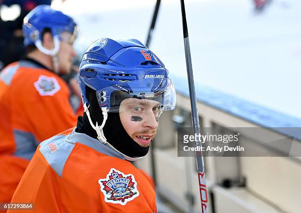 Adam Larsson of the Edmonton Oilers takes a break during practice in advance of the 2016 Tim Hortons NHL Heritage Classic game at Investors Group...