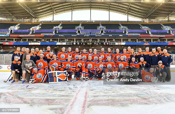 The Edmonton Oilers pose for a photo in advance of the 2016 Tim Hortons NHL Heritage Classic game at Investors Group Field on October 22, 2016 in...