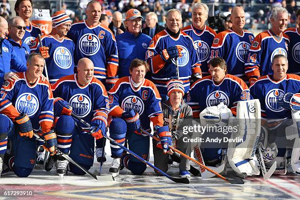 Edmonton Oilers alumni pose for a photo in advance of the 2016 Tim Hortons NHL Heritage Classic alumni game at Investors Group Field on October 22,...