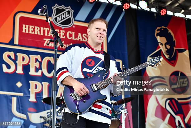 Almost Famous perform in Spectator Plaza in advance of the 2016 Tim Hortons NHL Heritage Classic alumni game at Investors Group Field on October 22,...