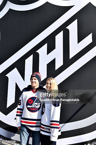 Fans take part in events at Spectator Plaza prior to the 2016 Tim Hortons NHL Heritage Classic alumni game at Investors Group Field on October 22,...