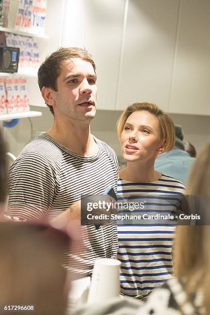 Actress Scarlett Johansson with her husband Romain Dauriac attend the Opening of their New Store "Yummy Pop", on October 22, 2016 in Paris, France.
