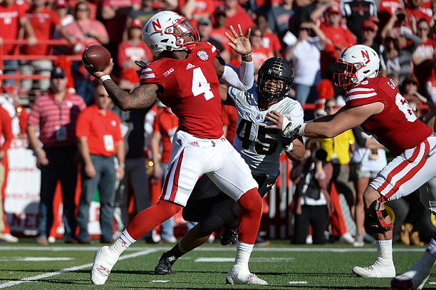 Quarterback Tommy Armstrong Jr. #4 of the Nebraska Cornhuskers prepares to pass against the Purdue Boilermakers at Memorial Stadium on October 22,...