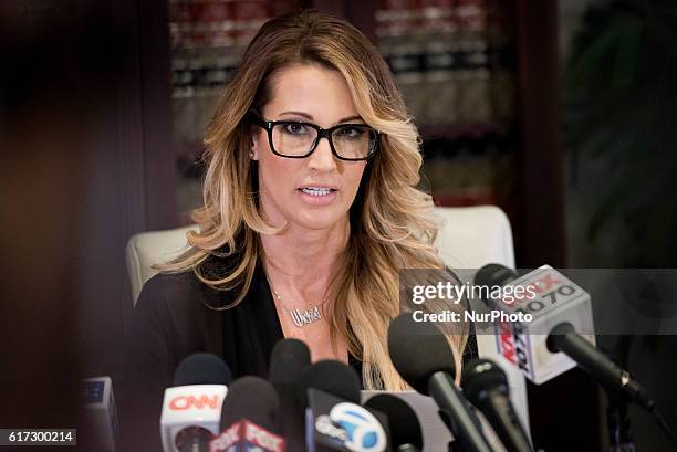 Adult film performer, jessica drake, who accuses Republican presidential nominee, Donald Trump, of sexual misconduct speaks to reporters during a...