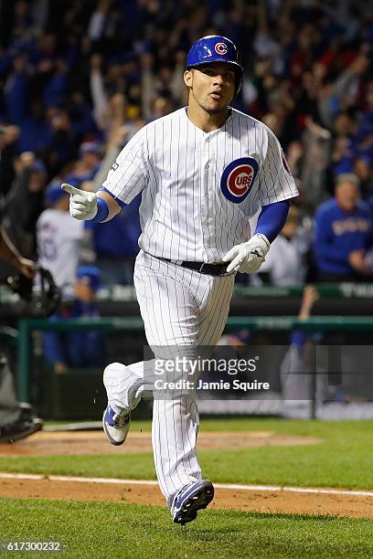 Willson Contreras of the Chicago Cubs runs the bases after hitting a solo home run in the fourth inning against the Los Angeles Dodgers during game...