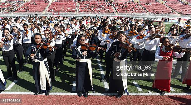 Group of 731 Clark County School District students perform on the field as they attempt to break the Guinness World Records title for biggest...