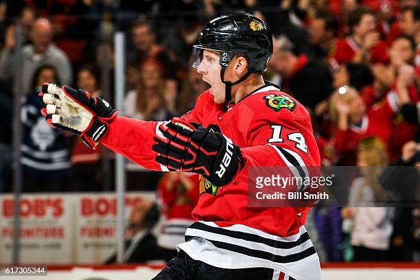 Richard Panik of the Chicago Blackhawks reacts after scoring against the Toronto Maple Leafs in the third period to tie the game at the United Center...