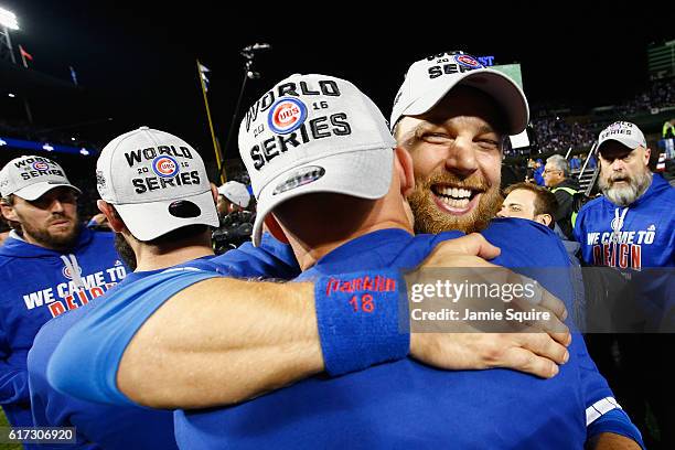 Ben Zobrist of the Chicago Cubs celebrates after defeating the Los Angeles Dodgers 5-0 in game six of the National League Championship Series to...