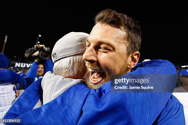 Ben Zobrist of the Chicago Cubs celebrates after defeating the Los Angeles Dodgers 5-0 in game six of the National League Championship Series to...