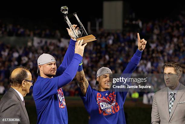 Co-MVPs Jon Lester and Javier Baez of the Chicago Cubs pose after defeating the Los Angeles Dodgers 5-0 in game six of the National League...