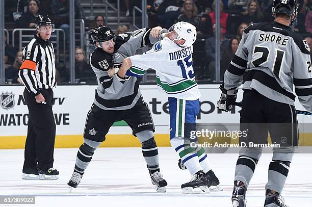 Kyle Clifford of the Los Angeles Kings gets into a scuffle with Derek Dorsett of the Vancouver Canucks at STAPLES Center on October 22, 2016 in Los...
