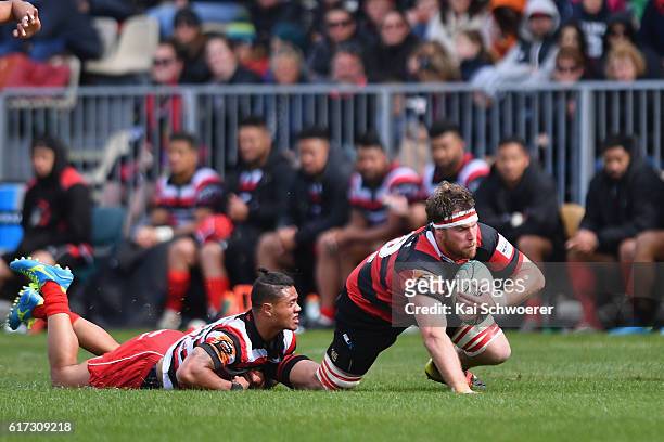 David McDuling of Canterbury is tackled by Nathan De Thierry of Counties Manukau during the Mitre 10 Cup Semi Final match between Canterbury and...