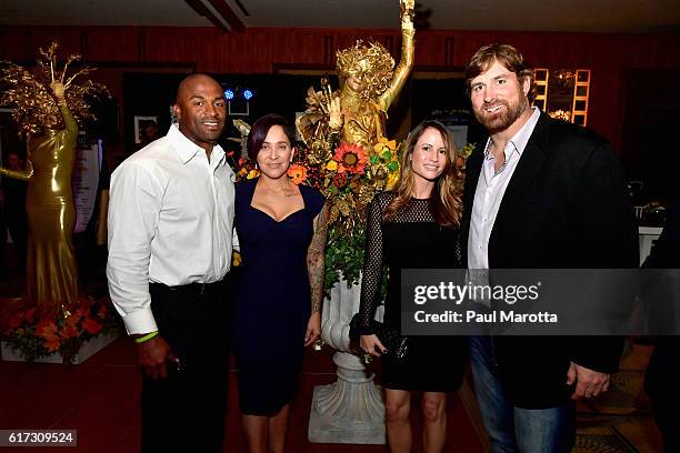 Matt and Susie Light and and Sammy and Leslie Morris attend the UnMask Cancer annual fundraiser to support patient care and cancer research at the...