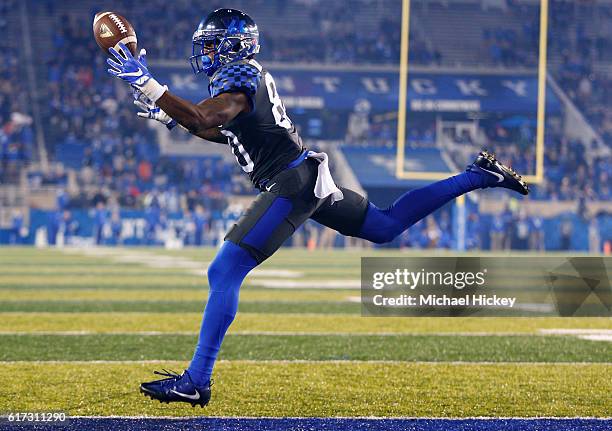 Tavin Richardson of the Kentucky Wildcats reaches for the ball to make the two point conversion during the game against the Mississippi State...