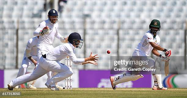 Gary Ballance of England catches out Tamim Iqbal of Bangladesh during the 4th day of the 1st Test match between Bangladesh and England at Zohur Ahmed...