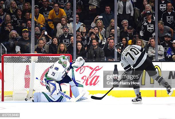 Tanner Pearson of the Los Angeles Kings scores on Jacob Markstrom of the Vancouver Canucks during the overtime shootout period at Staples Center on...