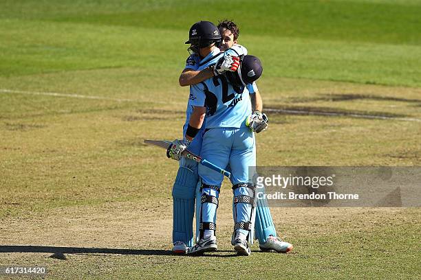 Kurtis Patterson and Peter Nevill of the Blues celebrate winning the Matador BBQs One Day Cup Final match between Queensland and New South Wales at...