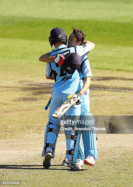 Kurtis Patterson and Peter Nevill of the Blues celebrate winning the Matador BBQs One Day Cup Final match between Queensland and New South Wales at...