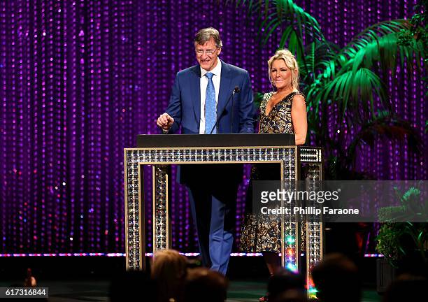 Presenters John Streur and Vicki Benjamin speak onstage during the Environmental Media Association 26th Annual EMA Awards Presented By Toyota, Lexus...