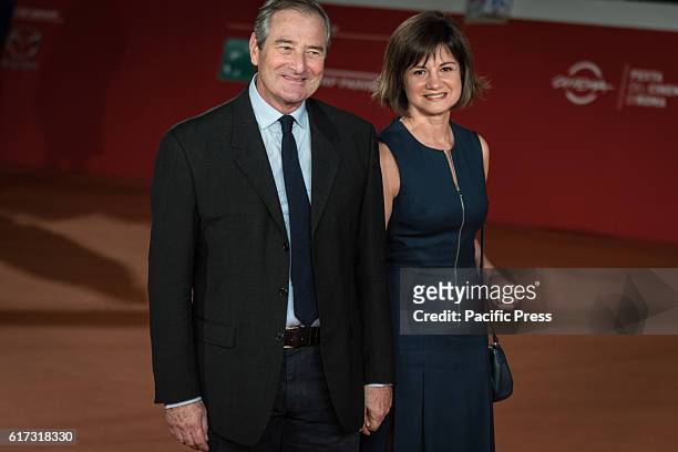 Julian Wadham and a guest walk a red carpet for 'The English Patient - Il Paziente Inglese' during the 11th Rome Film Festival at Auditorium Parco...