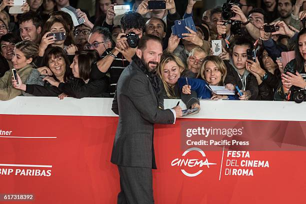 Ralph Fiennes walk a red carpet for 'The English Patient - Il Paziente Inglese' during the 11th Rome Film Festival at Auditorium Parco Della Musica.