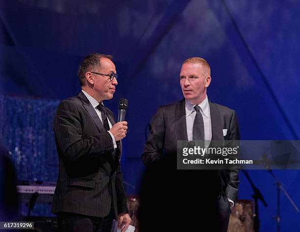 Dr. Agustín Arteaga and Gavin Delahunty on stage at TWO x TWO For AIDS and Art 2016 on October 22, 2016 in Dallas, Texas.