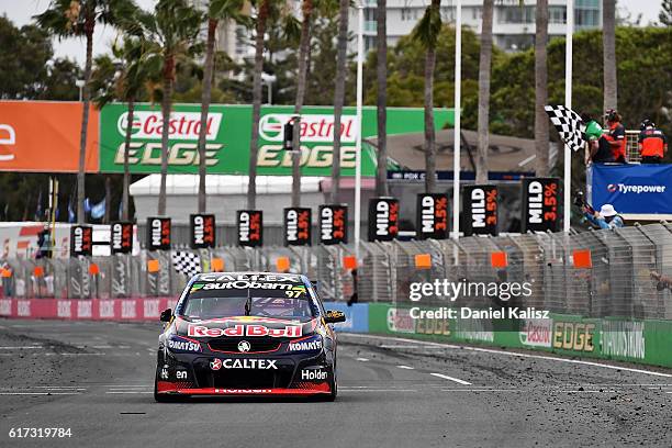 Shave Van Gisbergen drives the Red Bull Racing Australia Holden Commodore VF takes the chequred flag to take out the pirtek endurance cup during race...