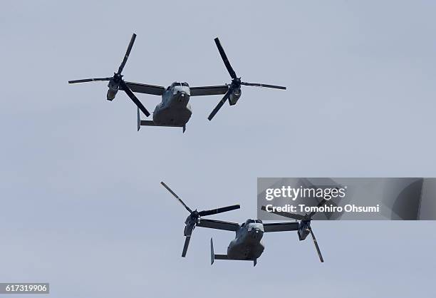 Pair of the V-22 Osprey aircraft fly during the annual review at the Japan Ground Self-Defense Force Camp Asaka on October 23, 2016 in Asaka, Japan.