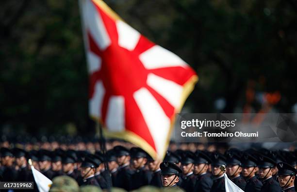 Members of the the Japan Maritime Self-Defense Force attend the annual review at the Japan Ground Self-Defense Force Camp Asaka on October 23, 2016...