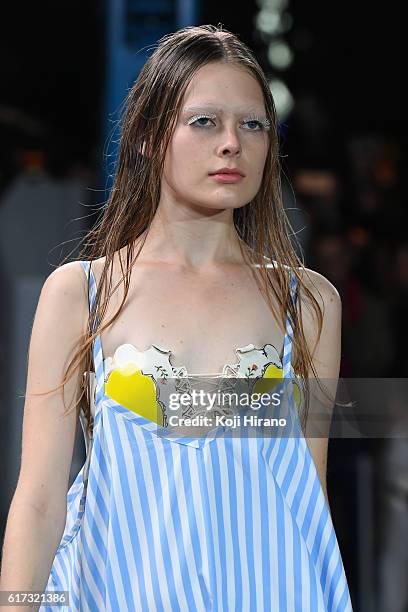 Model showcases designs on the runway during the MIKIO SAKABE show as part of Amazon Fashion Week TOKYO 2017 S/S at the Miyashita Park on October 22,...