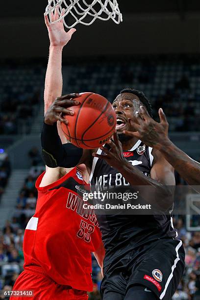 Cedric Jackson of Melbourne United drives to the basket during the round three NBL match between Melbourne United and the Perth Wildcats at Hisense...