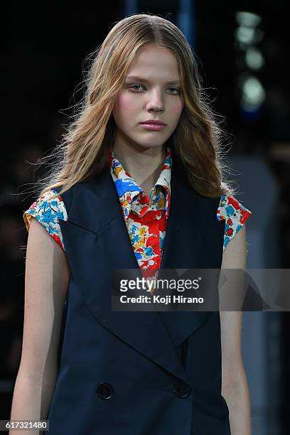 Model showcases designs on the runway during the MIKIO SAKABE show as part of Amazon Fashion Week TOKYO 2017 S/S at the Miyashita Park on October 22,...