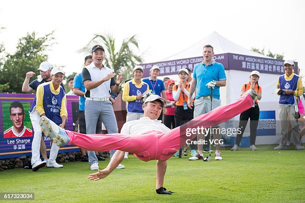 Retired Chinese gymnast Xing Aowei in action during round 2 on the second day of the World Celebrity Pro-Am 2016 Mission Hills China Golf Tournament...