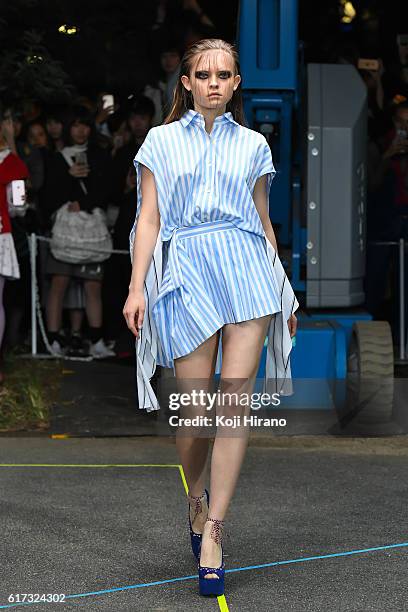 Model showcases designs on the runway during the MIKIO SAKABE show as part of Amazon Fashion Week TOKYO 2017 S/S at the Miyashita Park on October 22,...