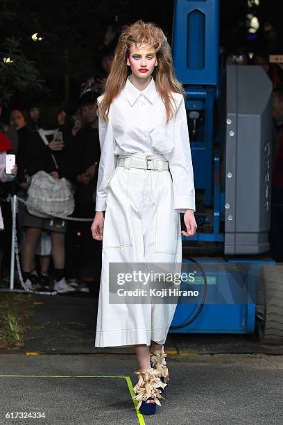 Model showcases designs on the runway during the MIKIO SAKABE show as part of Amazon Fashion Week TOKYO 2017 S/S at the Miyashita Park on October 22,...