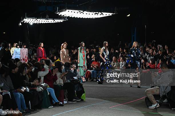 Model showcases designs on the runway during the MIKIO SAKABE show as part of Amazon Fashion Week TOKYO 2017 S/S at the Miyashita Park on October 22,...