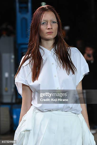 Model showcases designs on the runway during the MIKIO SAKABE show as part of Amazon Fashion Week TOKYO 2017 S/S at the Miyashita Park on October 22,...