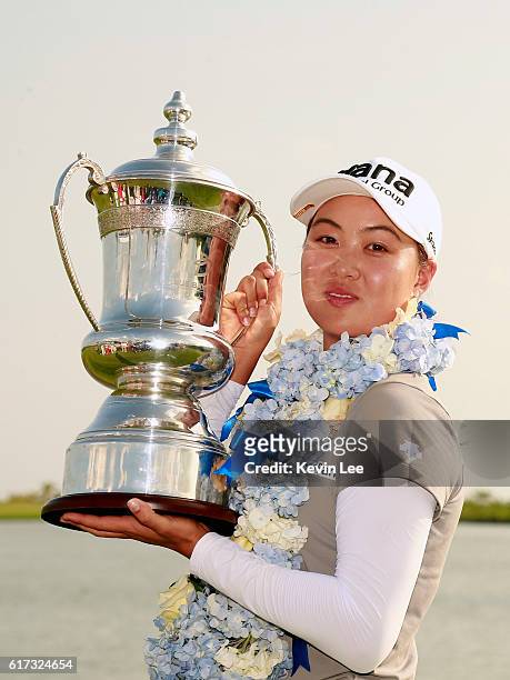 Minjee Lee of Australia poses with her trophy after winning the Blue Bay LPGA on Day 4 on October 23, 2016 in Hainan Island, China.