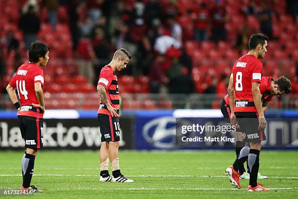 Wanderers players look dejected after the round three A-League match between the Western Sydney Wanderers and the Newcastle Jets at Spotless Stadium...