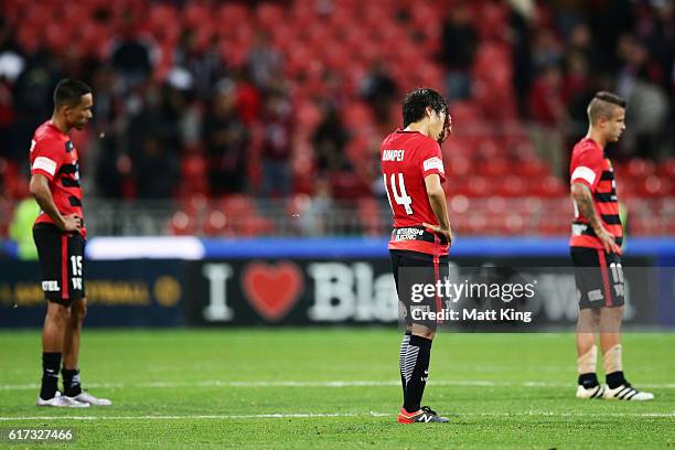 Wanderers players look dejected after the round three A-League match between the Western Sydney Wanderers and the Newcastle Jets at Spotless Stadium...