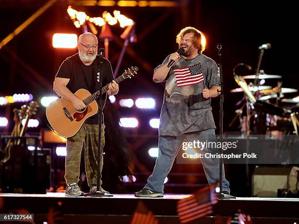 Musicians Kyle Gass and Jack Black of Tenacious D perform onstage during "Spike's Rock the Troops" event held at Joint Base Pearl Harbor - Hickam on...