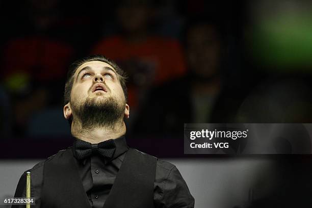 Sydney Wilson of England reacts during the first round match against John Higgins of Scotland on Day 1 of the International Championship 2016 at...