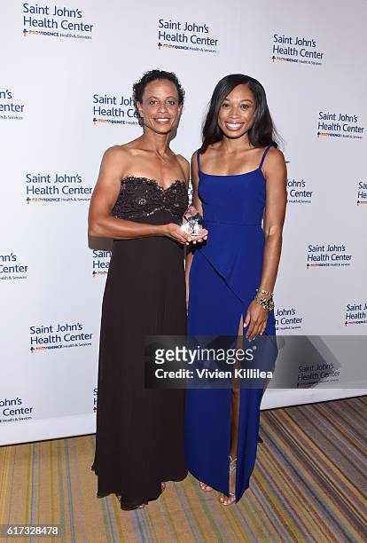 Athletes Joanna Hayes and Allyson Felix attend St. John's Health Center 2016 Caritas Gala on October 22, 2016 in Beverly Hills, California.