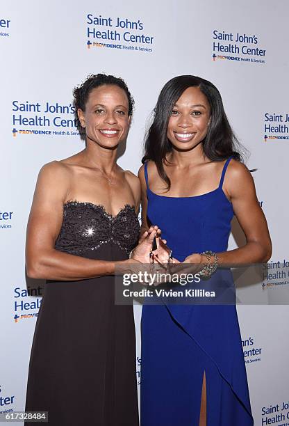 Athletes Joanna Hayes and Allyson Felix attend St. John's Health Center 2016 Caritas Gala on October 22, 2016 in Beverly Hills, California.