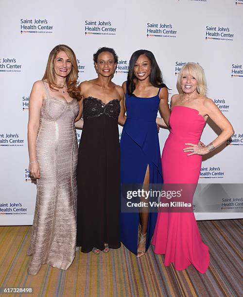 Caritas Gala Co-Chair Kathy Yawitz, athletes Joanna Hayes and Allyson Felix and Caritas Gala Co-Chair and Judy Beck attend St. John's Health Center...