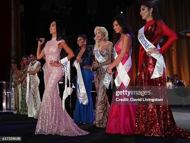 Pageant participants appear on stage at the TransNation Festival's 15th Annual Queen USA Transgender Beauty Pageant at The Theatre at Ace Hotel on...