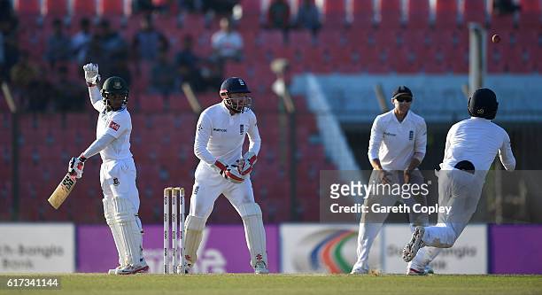 Bangladesh captain Mushfiqur Rahim is caught out by Gary Ballance of England during the 4th day of the 1st Test match between Bangladesh and England...
